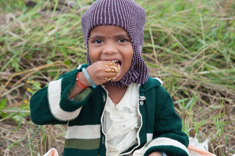 Child eating rice_RVP.jpg